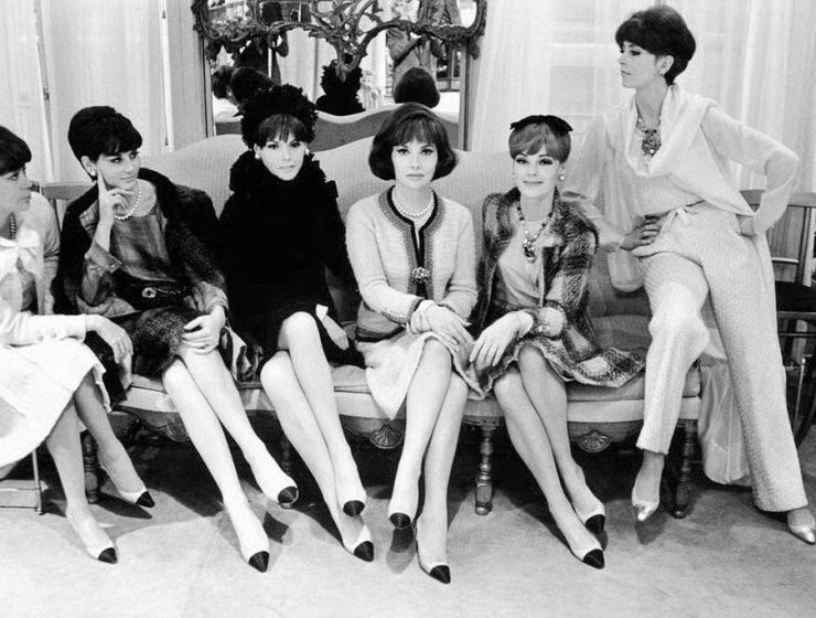 Gina Lollobrigida surrounded by Chanel models wearing suits two tone shoes. Couture Fall 1964 photo Chanel